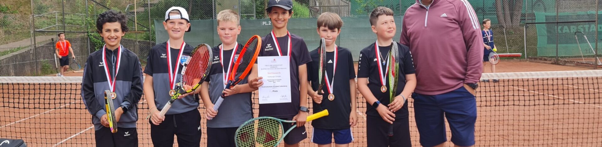 Tennisteam holt Gold